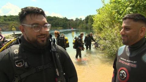 Usman Zahid (left) with Mohammed Salim Patel in their wet suits after scuba diving