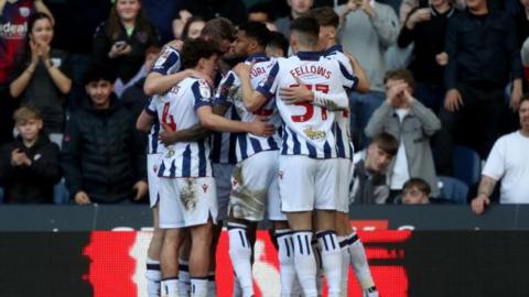 West Brom players celebrate