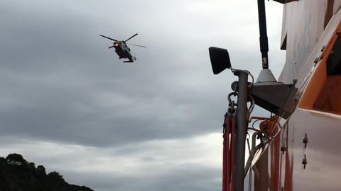 Coastguard helicopter and lifeboat