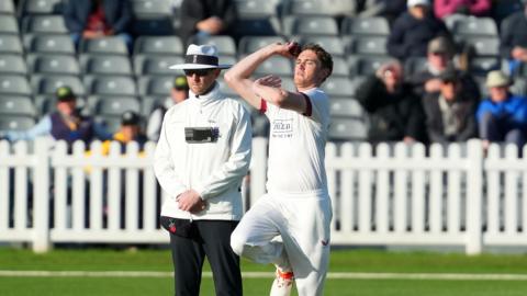 Lancashire bowler George Balderson running into bowl against Gloucestershire.
