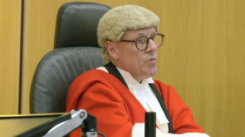 Judge in court during sentencing