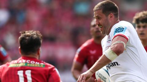 Stuart McCloskey bursts through the Scarlets defence