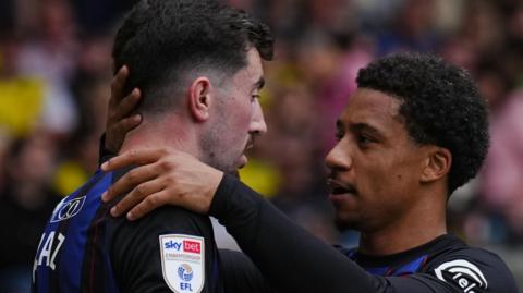Finn Azaz (left) is congratulated after scoring for Middlesbrough