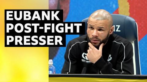 Chris Eubank Jr looks dejected at post-fight press conference