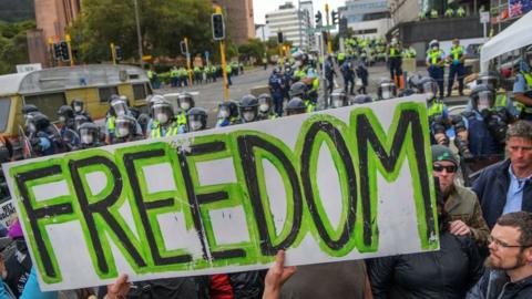 Protesters against Covid-19 vaccine manadates and restrictions gather near parliament grounds in Wellington on March 2, 2022.