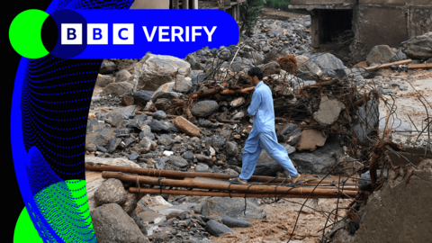 A resident walks on a makeshift crossway made of bamboo and wooden planks over rain water flowing from mountains crossing a damaged area, following a storm that caused heavy rains and flooding in Bayshonai Kalay, in Buner district, in Khyber Pakhtunkhwa province, Pakistan