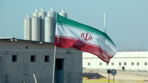 Image shows an Iranian flag in Iran's Bushehr nuclear power plant