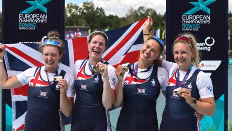 Great Britain rowers celebrate with gold medals