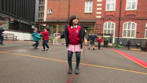 Girl skipping