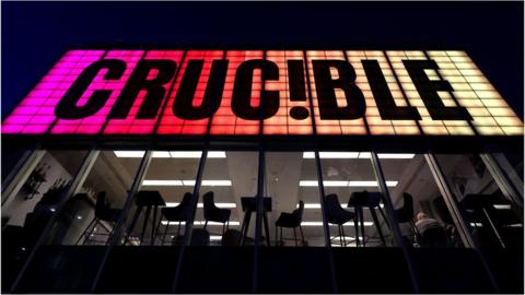 Sheffield's Crucible Theatre illuminated at night