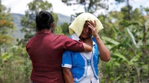 Relatives of 2-1/2-year-old Guatemalan migrant Wilmer Josue Ramirez, who was detained last month at the U.S.-Mexico border but released from U.S. custody with his mother during treatment for an illness, react during his funeral at a cemetery in the village of Olopa, Guatemala May 26, 2019