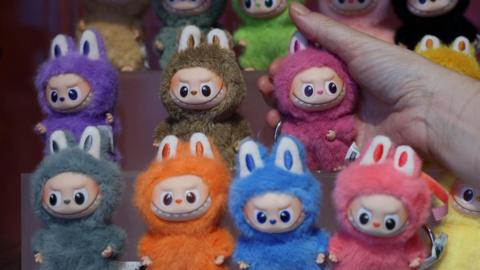 Multicoloured furry dolls