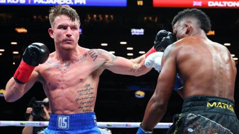 Dalton Smith (left) punches Subriel Matias during their WBC super lightweight championship bout in New York