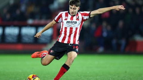 Joel Colwill scores for Cheltenham