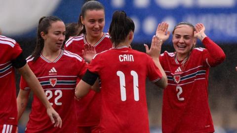 Wales players celebrate Lily Woodham's goal