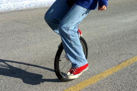 A child on a unicycle