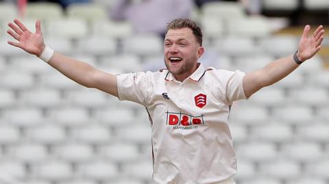 Sam Cook appeals during a game for Essex