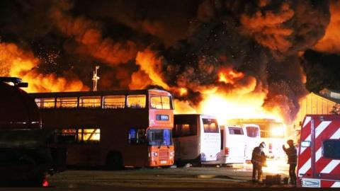 Fire engulfs a fleet of buses