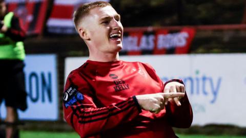 Ross Tierney celebrates scoring