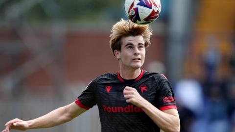 Nathan Lowe attacks the ball on his Walsall debut as a second-half sub in Saturday's 1-0 league defeat at Tranmere