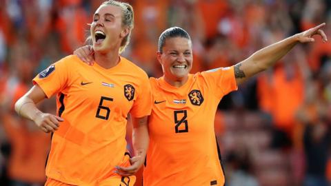 Jill Roord (left) celebrates scoring