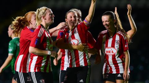 Exeter City women celebrate a goal