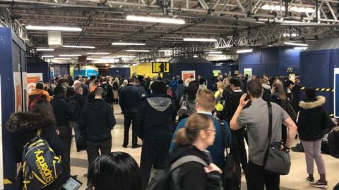 Commuters at station