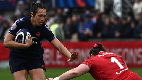 France's lock Manae Feleu fends off Wales' prop Gwenllian Pyrs 