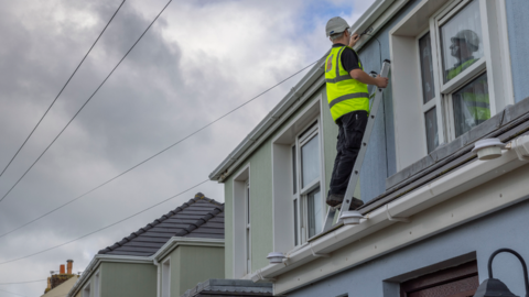 Engineer installing fibre