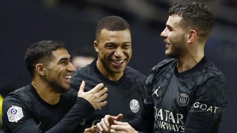 PSG players celebrate Kylian Mbappe's goal against Nantes