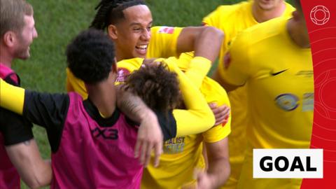 Riley O'Sulllivan celebrating with Harborough Town teammates 