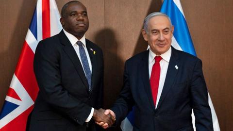 David Lammy and Benjamin Netanyahu shaking hands