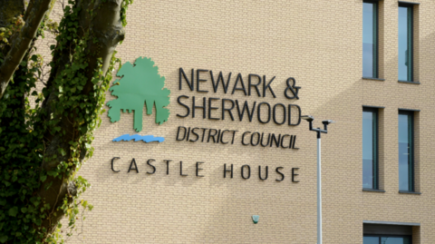 Newark and Sherwood District Council's Castle House building is pictured with a tree to the left