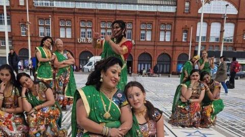 Dancers perform on Indian Comedy Carpet