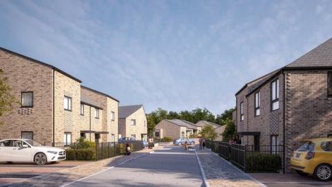 A CGI image of what the homes could look like with cars on the drive, roads and pavements