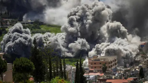 Smoke rises following an Israeli strike in Nabatieh, Lebanon