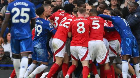 Chelsea and Nottingham Forest players clash