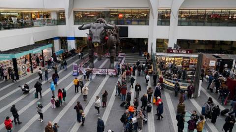 Passengers on the concourse at Birmingham New Street Station