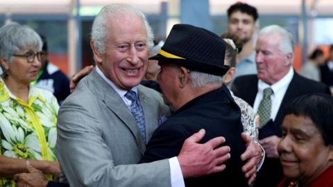 King Charles meets Uncle James Michael 'Widdy' Welsh, a member of the Indigenous community, during a visit to the National Centre of Indigenous Excellence in Sydney, Australia