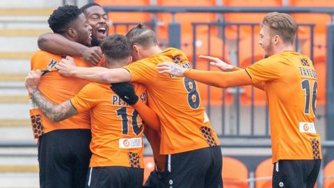 Barnet celebrate Wesley Fonguck's goal