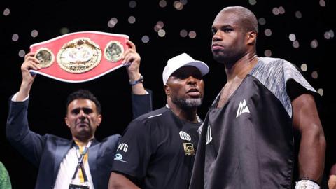 Don Charles looks on at Daniel Dubois before a fight begins