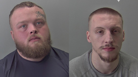 Two police mugshots of men staring at the camera. The man on the left has brown hair and a reddish beard and is wearing a blue T-shirt. The man on the right has a shaved brown hair and a goatee and is wearing a grey sweatshirt.Both are looking into the camera.