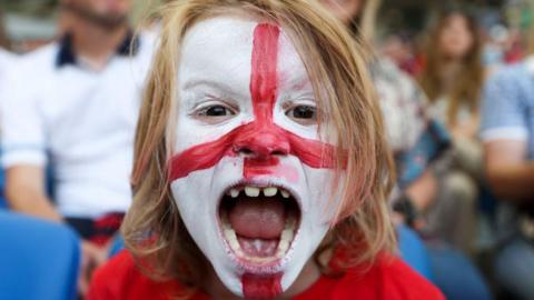 An England fan with a painted face