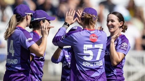Kate Cross celebrates a wicket