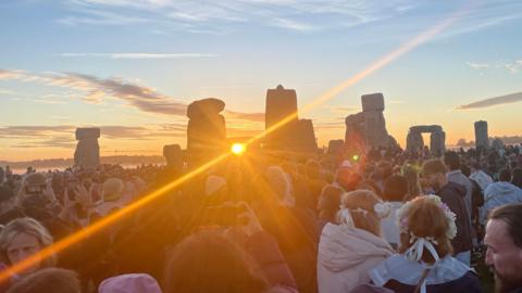 Crowds gather at Stonehenge to celebrate the summer solstice.
