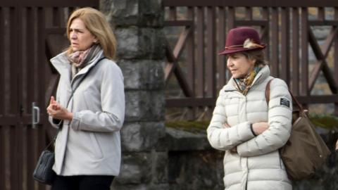 Princess Cristina of Spain (L) and Princess Elena of Spain (R) are seen in December 2017 file photograph wearing outdoor clothes