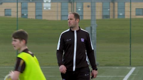 Dan Kennerley, Blyth Academy PE teacher wearing a black tracksuit 