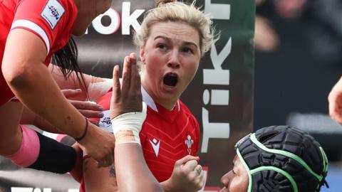 Keira Bevan celebrates her try