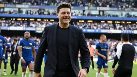 Chelsea boss Mauricio Pochettino smiling