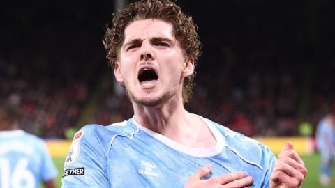 Jack Rudoni celebrates scoring